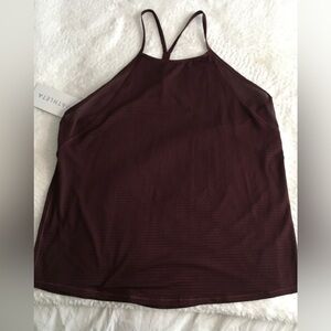 Athleta Chi Mesh Train Tank
Ultra lightweight 
Fits close to skin, hip length